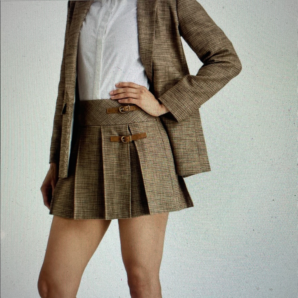 Sandro -- chic pleated houndstooth tweed mini skirt with buckle details